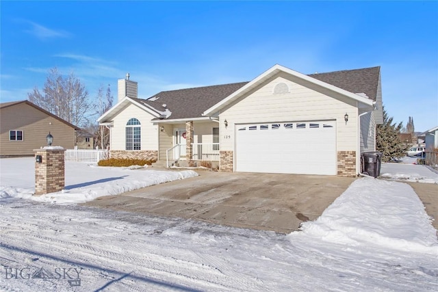 single story home featuring a garage