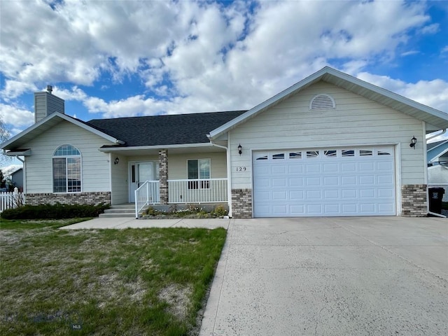 129 Red Mtn, Butte, MT 59701 - single story home featuring brick siding, a porch, a chimney, and driveway