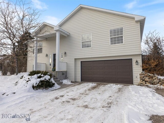 view of front of property featuring a garage