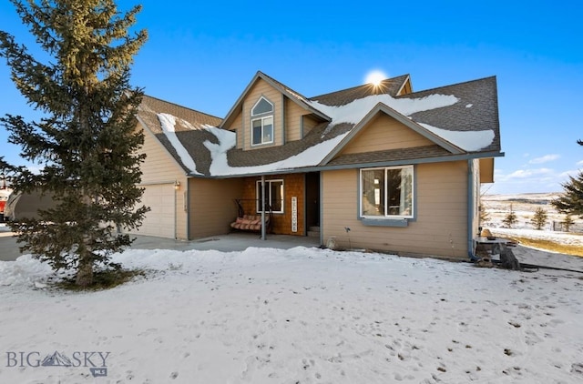 view of front of house with a garage