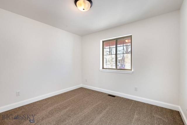 spare room with carpet flooring