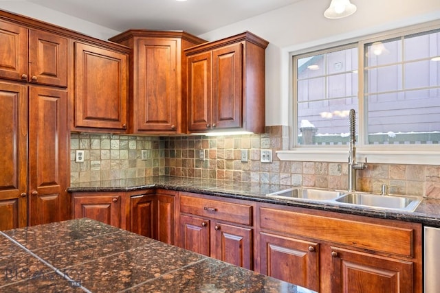 kitchen with sink and decorative backsplash