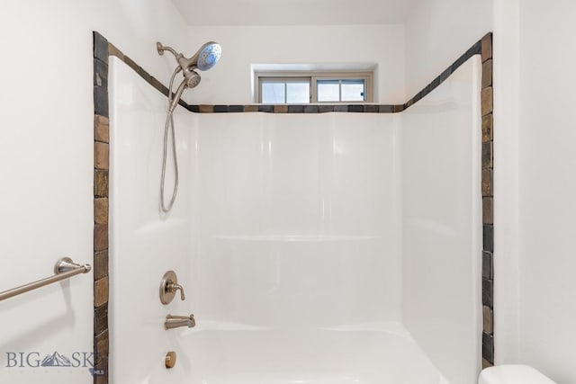 bathroom with shower / bathtub combination