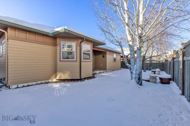 view of snow covered property