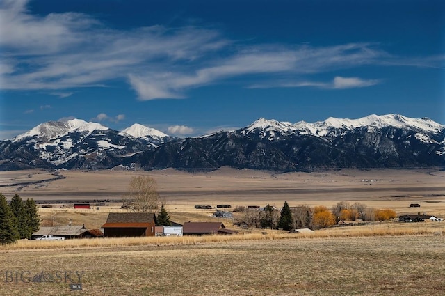 property view of mountains featuring a rural view