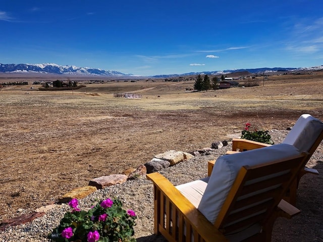 mountain view featuring a rural view