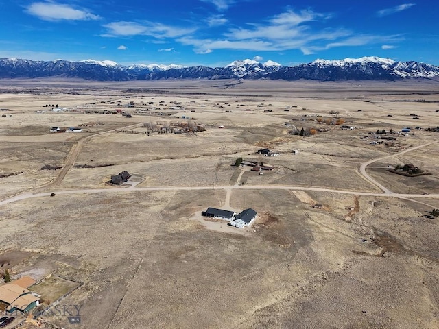 drone / aerial view featuring a mountain view