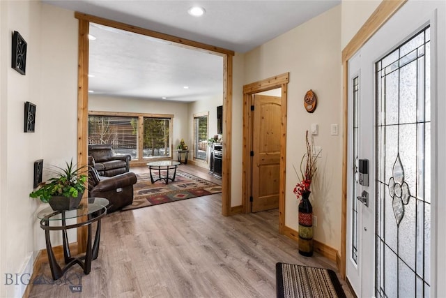 foyer featuring light wood-type flooring