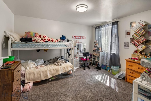 bedroom featuring carpet