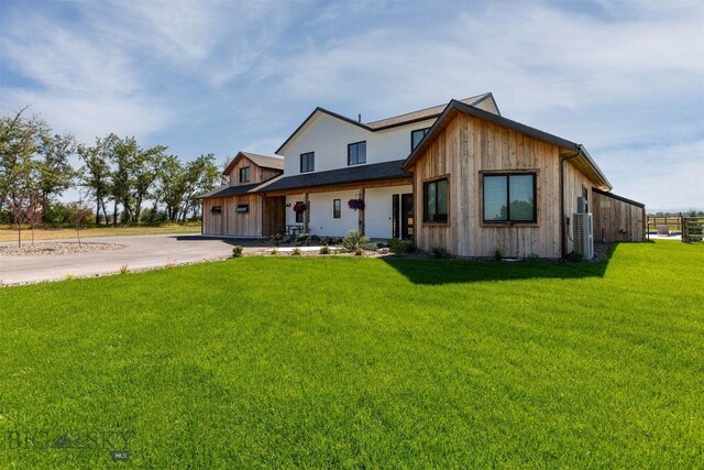 view of front of home with a front yard