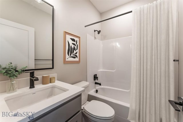 full bathroom featuring toilet, shower / bath combo with shower curtain, and vanity