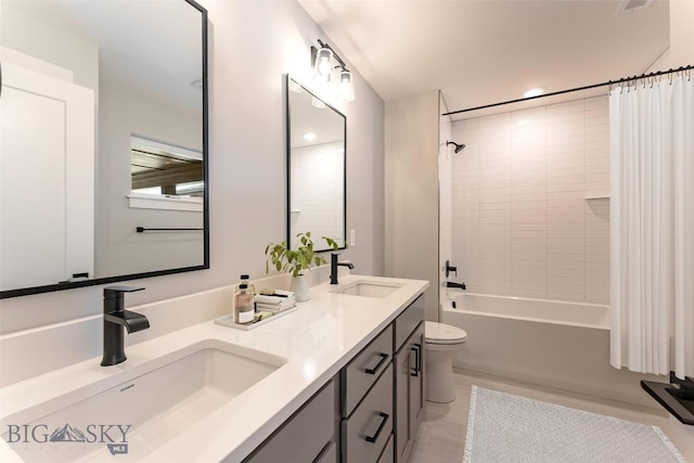 full bathroom with toilet, vanity, and shower / bath combination with curtain