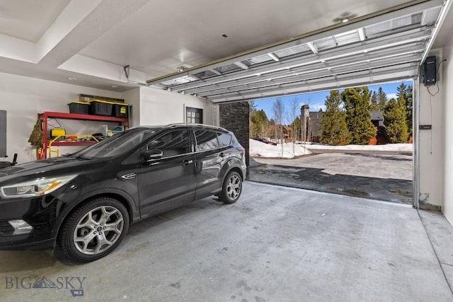 garage featuring a carport