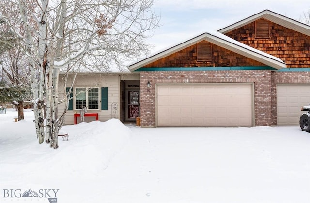 view of front of property featuring a garage