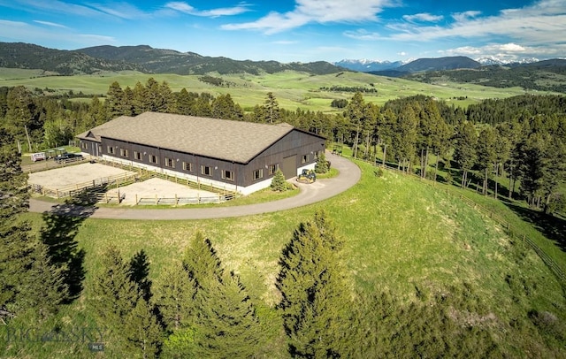 drone / aerial view featuring a mountain view