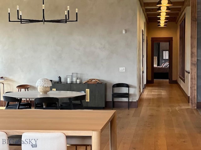 dining room with wood-type flooring