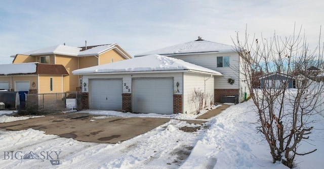 exterior space with a garage