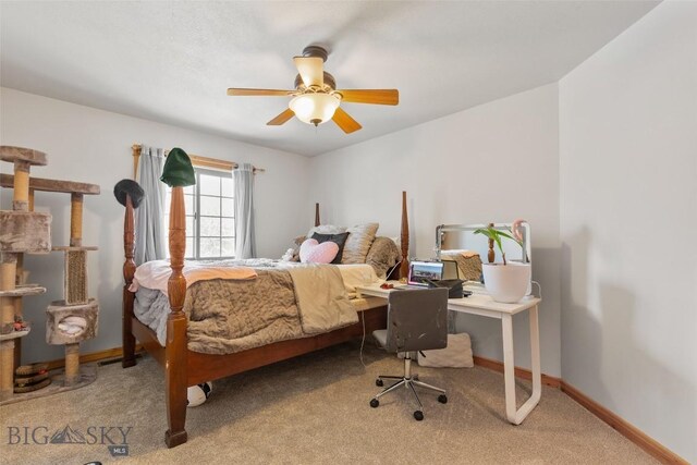 bedroom with light carpet and ceiling fan