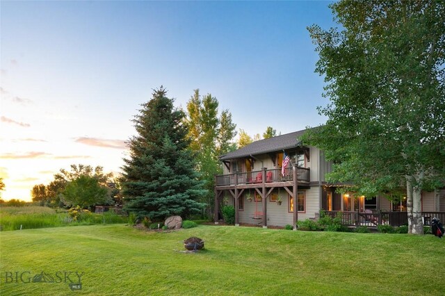 exterior space featuring a deck and a fire pit