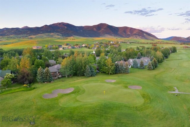 aerial view at dusk with a mountain view