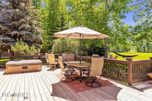 3213 Augusta Dr, Bozeman, MT 59715 - wooden deck featuring a covered hot tub, outdoor dining space, and view of wooded area