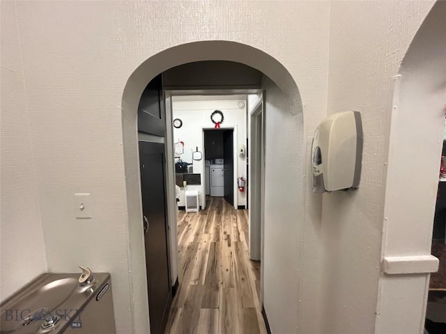 hall with washer / dryer