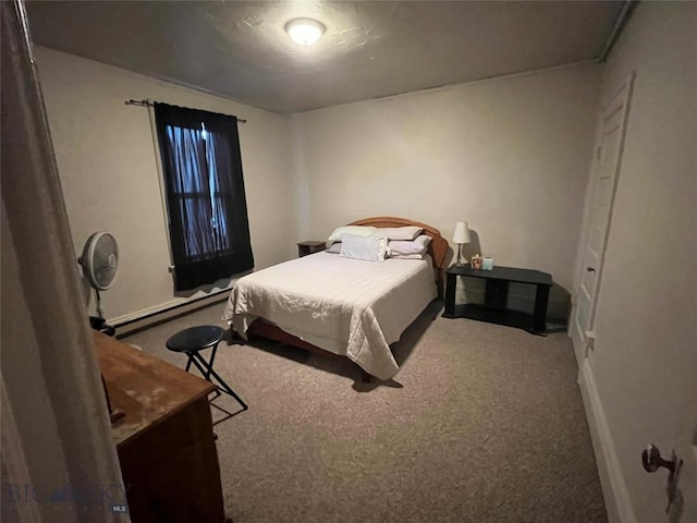 carpeted bedroom featuring a baseboard radiator