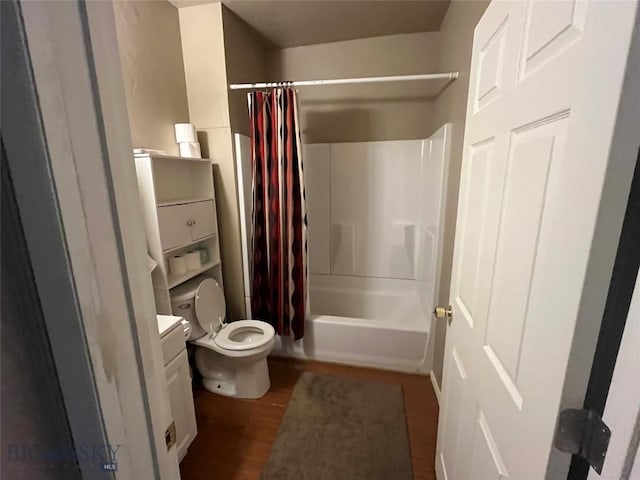 full bathroom with toilet, wood-type flooring, vanity, and shower / bath combo with shower curtain