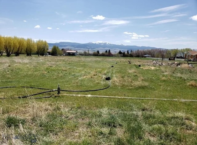 property view of mountains featuring a rural view