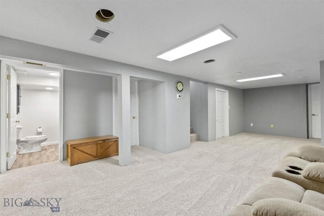 basement featuring carpet flooring