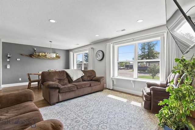 living room with light hardwood / wood-style floors