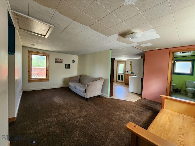 unfurnished living room with carpet flooring