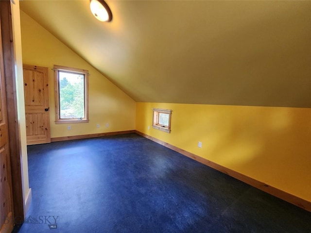 bonus room featuring vaulted ceiling