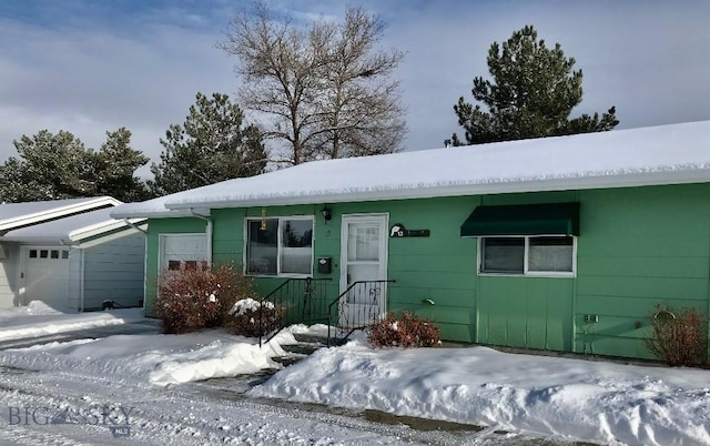 ranch-style house with an attached garage