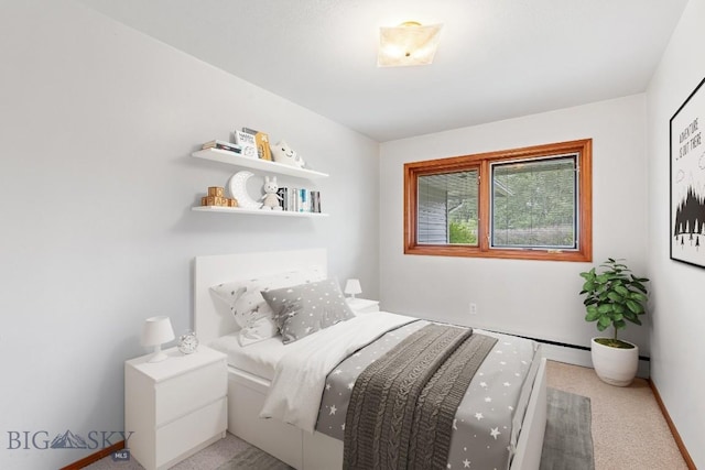 bedroom with light colored carpet