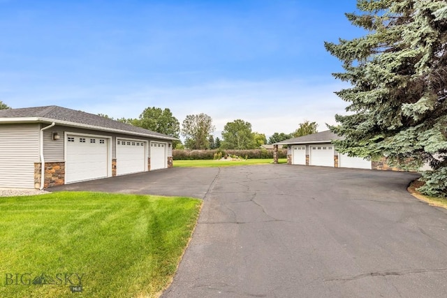 garage with a yard