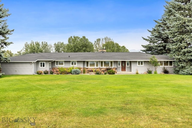 ranch-style home featuring a front yard