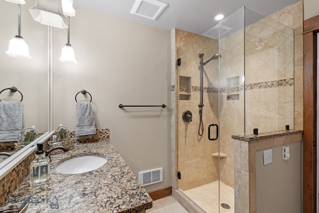9 Park Plaza Rd, Bozeman, MT 59715 - full bathroom featuring vanity, a shower stall, recessed lighting, and visible vents