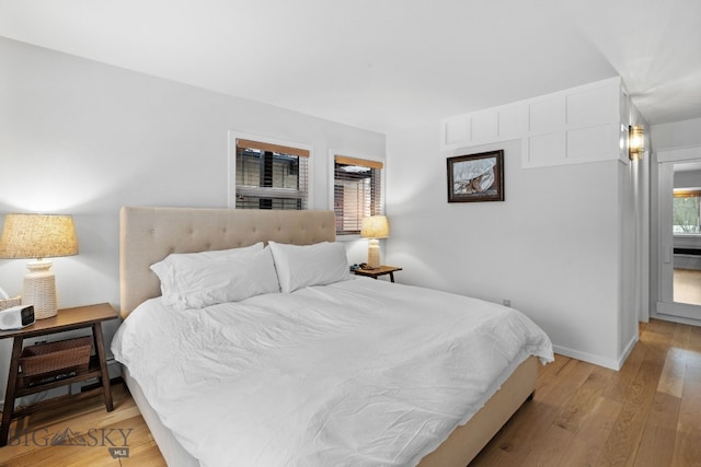 9 Park Plaza Rd, Bozeman, MT 59715 - bedroom featuring light wood-style floors and baseboards