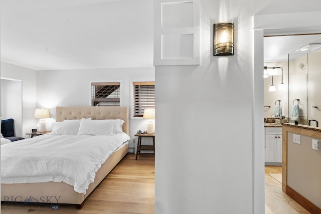 9 Park Plaza Rd, Bozeman, MT 59715 - bedroom featuring light wood-style floors and ensuite bath