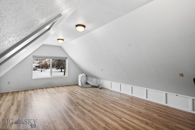 9 Park Plaza Rd, Bozeman, MT 59715 - additional living space featuring wood finished floors and lofted ceiling