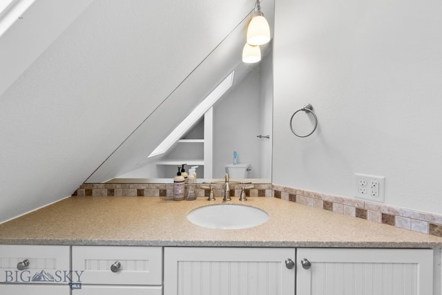 9 Park Plaza Rd, Bozeman, MT 59715 - bathroom with vanity, toilet, and a skylight