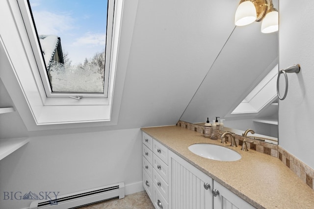 9 Park Plaza Rd, Bozeman, MT 59715 - bathroom featuring a baseboard heating unit, a skylight, and vanity