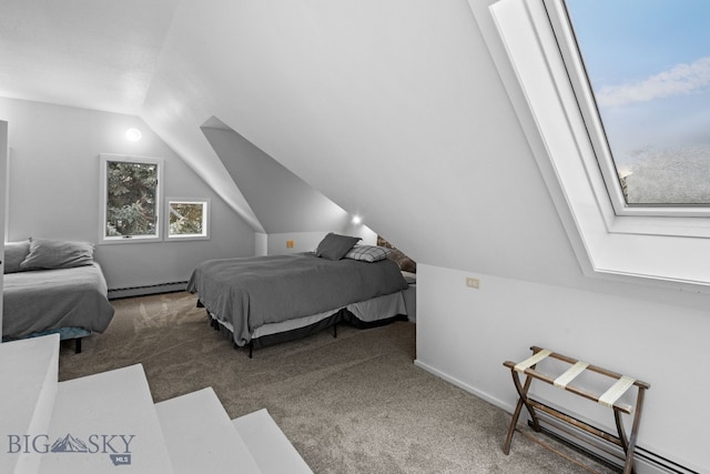9 Park Plaza Rd, Bozeman, MT 59715 - carpeted bedroom with baseboards, vaulted ceiling, and a baseboard radiator