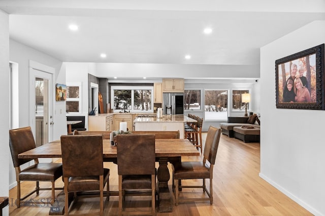 9 Park Plaza Rd, Bozeman, MT 59715 - dining space featuring light wood-style floors, baseboards, recessed lighting, and plenty of natural light