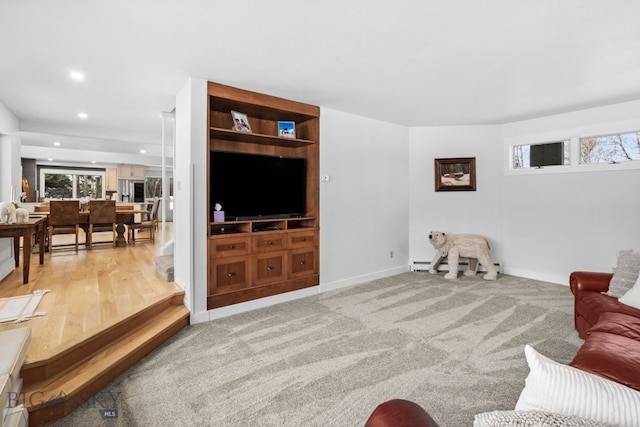 9 Park Plaza Rd, Bozeman, MT 59715 - carpeted living area featuring recessed lighting, baseboards, and a baseboard radiator