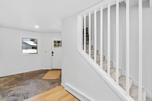 9 Park Plaza Rd, Bozeman, MT 59715 - foyer featuring stone finish floors, baseboards, recessed lighting, and stairs