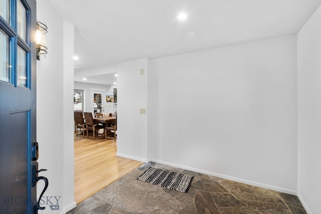 9 Park Plaza Rd, Bozeman, MT 59715 - foyer with recessed lighting, stone finish flooring, and baseboards
