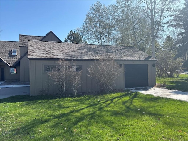 9 Park Plaza Rd, Bozeman, MT 59715 - view of home's exterior with board and batten siding, a yard, driveway, and roof with shingles