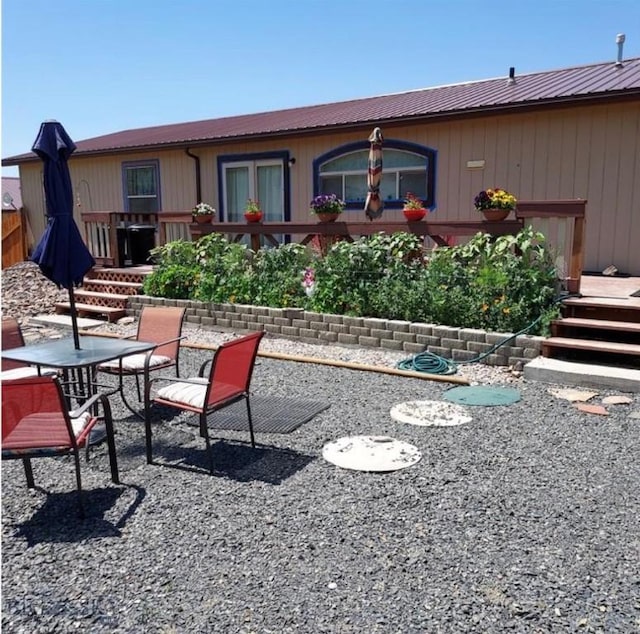 back of house featuring a patio area